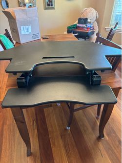 Sit and stand hydraulic table top desk