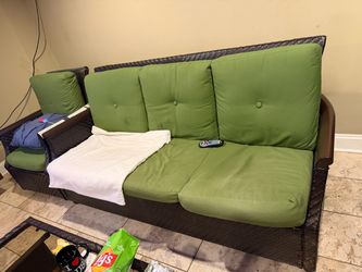 Outdoor Wicker Sofa with Green Cushions
