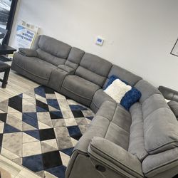 Fourth of July sale. Alejandra gray reclining sectional now $1599. Easy finance option. Same day delivery.