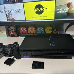 PlayStation 2 system with games