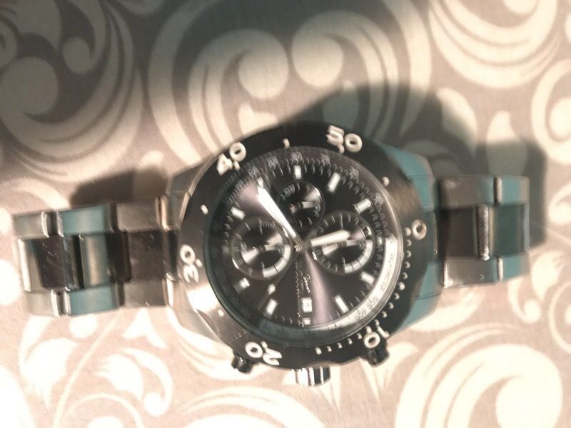 Black and silver Invicta Watch