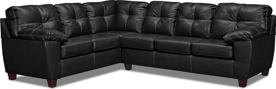 Black sectional couch with sleeper in good condition