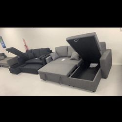 Brand New sectional sofa with chaise storage and pull out bed!  Gray and black available 