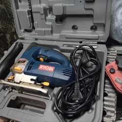 Ryobi Jig Saw with Laser and Accessories .