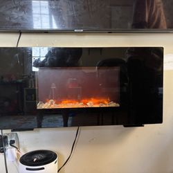 Electric wall mounted fireplaced