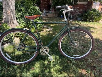 Raleigh Tourist classic city bike with a brown  leather saddle seat in great shape