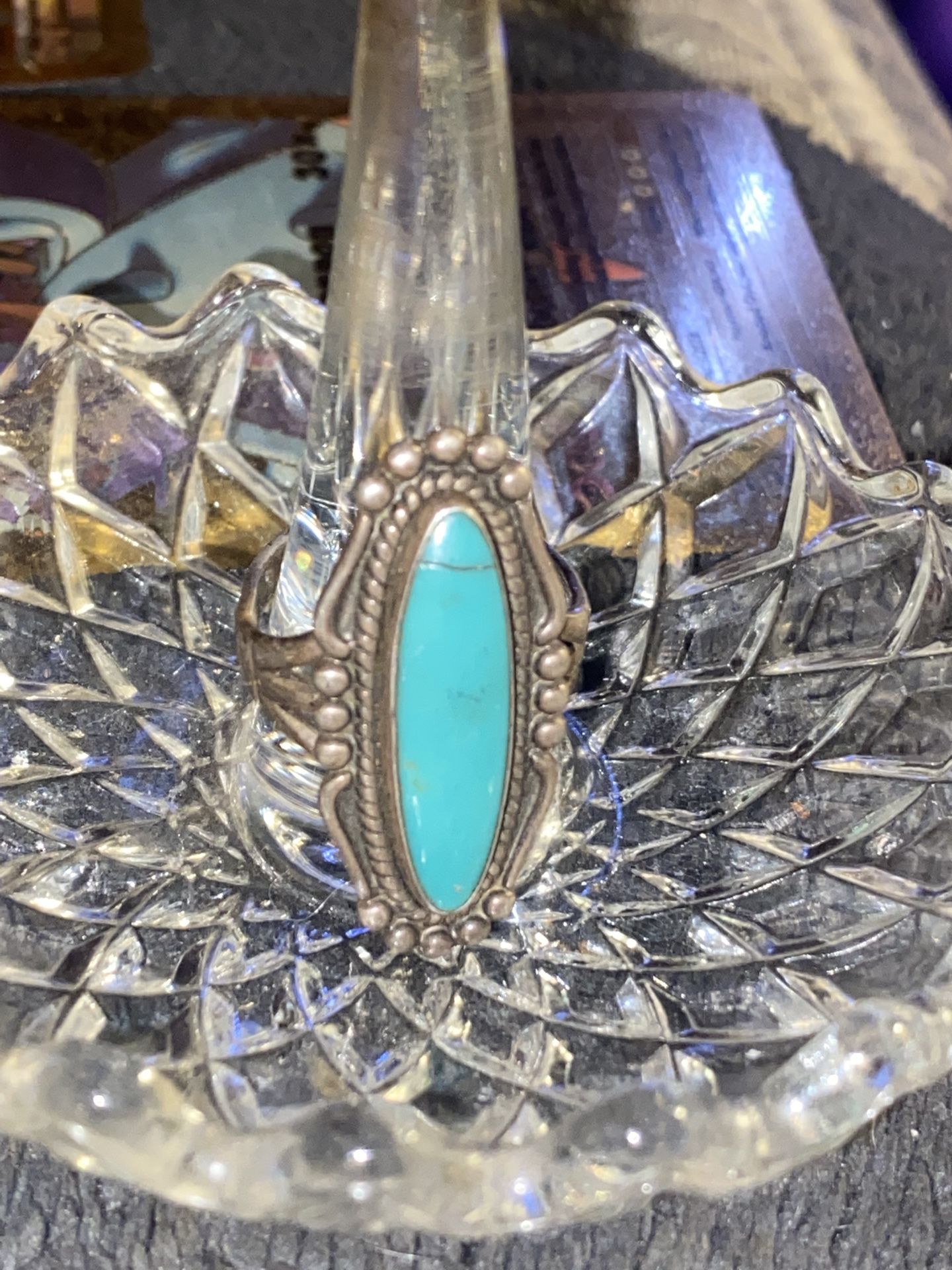 A vintage sterling silver baby blue turquoise ring
