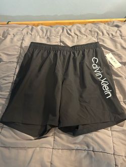 NWT Calvin Klein swimwear swim trunks men’s large Black with compression shirt interior liner