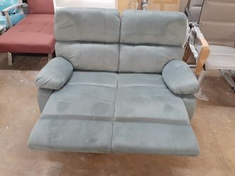 Brand new reclining LOVESEAT