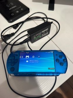 PSP 3000, with games