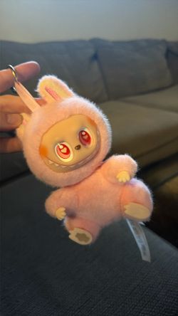 Pop Mart Labubu type doll.