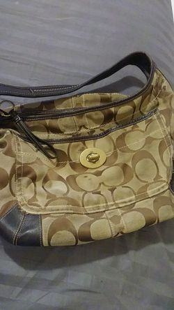 Authentic nice big roomy Coach Bag...large size and multiple pockets, very well made! 18"lx12"t×7 to 11.5wide...BIG SIZE!