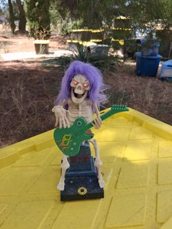 Animated Halloween Skeleton Guitar Player Figure