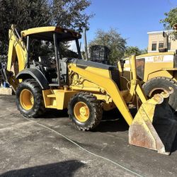60204A3 BACKHOE LOADER JOHN DEERE JD310G 4X4 2001 NEW ENGINE.