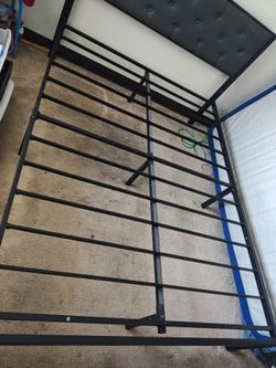 Dk gray bed frame with headboard like new, no mattress. $50 b/o