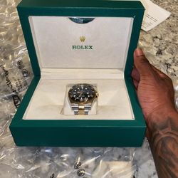 Rolex Submariner Date 16613, brand new and unworn with full box and papers.