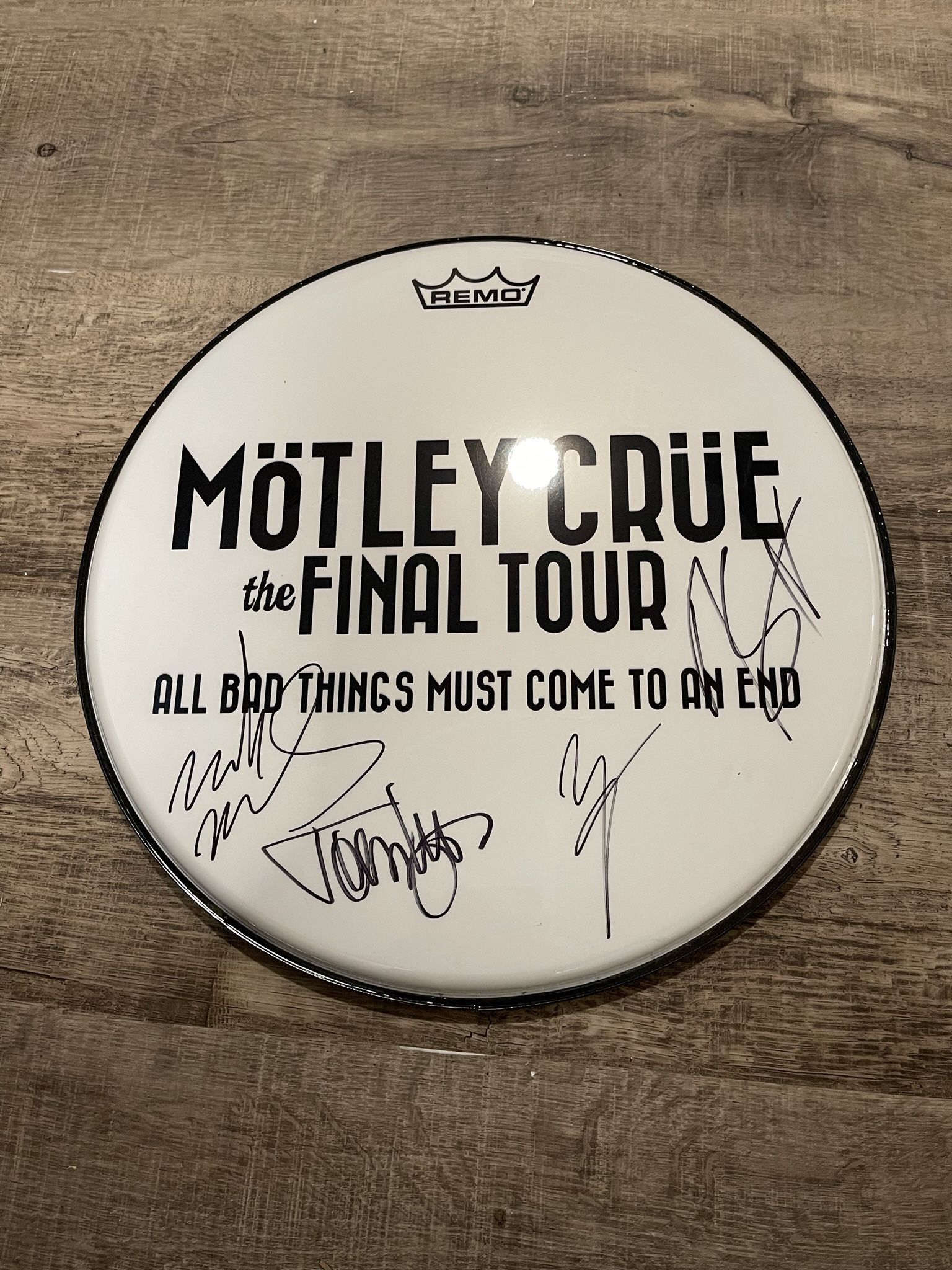 Motley Crue's Final Tour drum head signed by all 4 members!