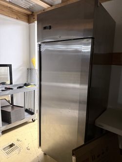 Freezer and refrigerator