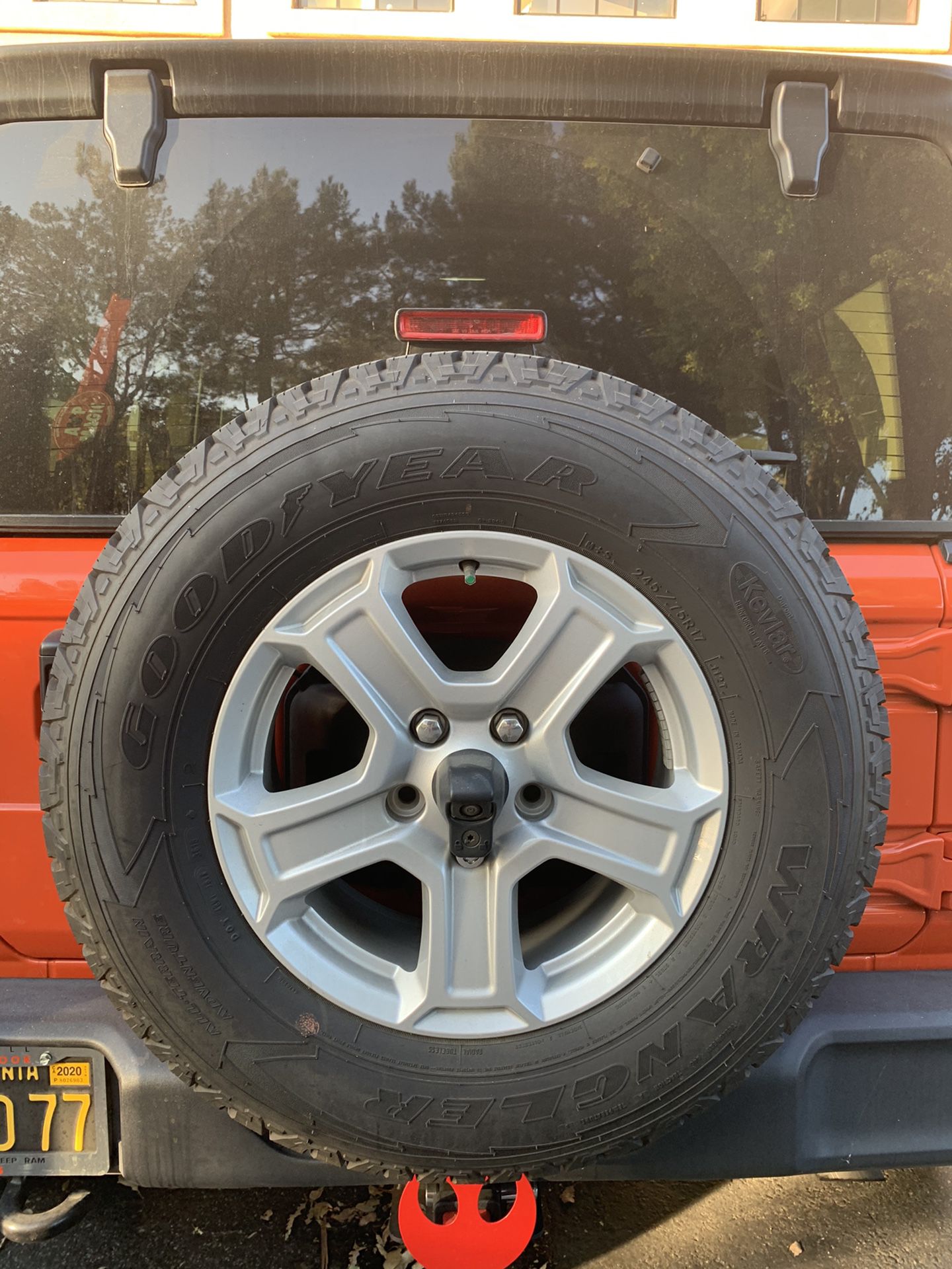 5 x Goodyear Wrangler All-Terrain Adventure tires with stock wheels.
