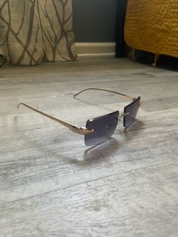 Cartier Rimless Rectangle Sunglasses $35