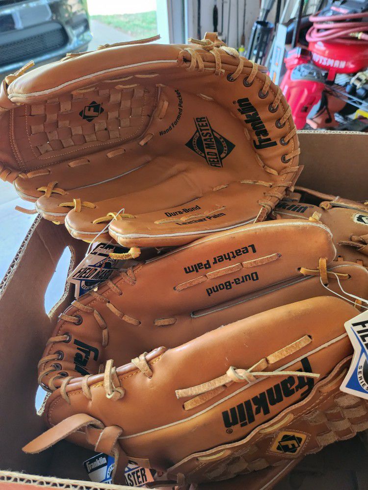 baseball gloves some are brand new 