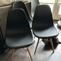Four Modern Black Chairs