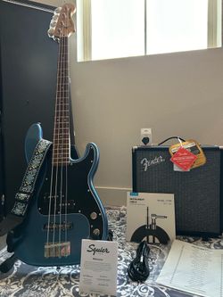 For Sale  ~ Fender Bass Guitar with accessories
