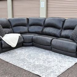 Double recline leather L shaped modular couch from Ashley