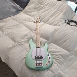Sterling by Music Man StingRay RAY4 Maple Fingerboard Electric Bass Guitar Mint Green White Pickguard

