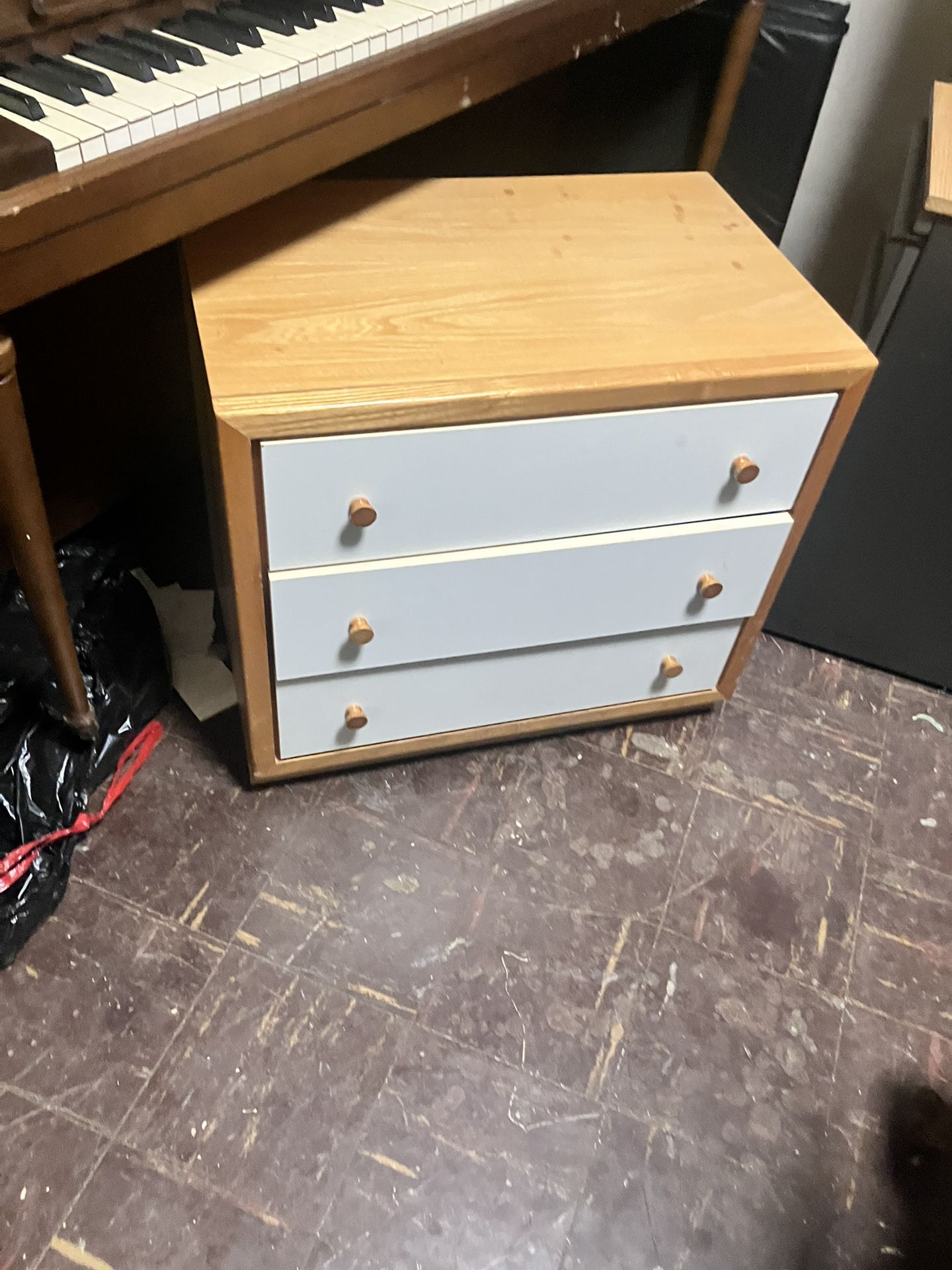 A Three Drawer Dresser 