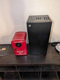 Xbox Mini Fridge and a Bluetooth Speaker Coca Cola Mini Fridge