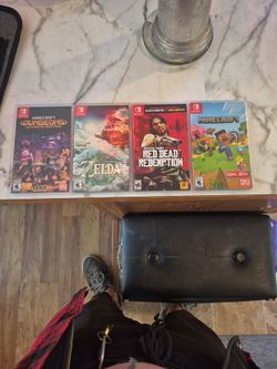 50$ takes ALL 4 nintendo switch games. Legend of Zelda, red dead redemption, minecraft