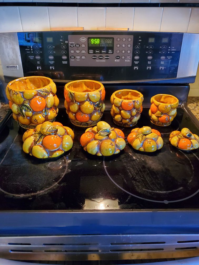Mid century Inarco orange spice fruit basket 8 piece canister set