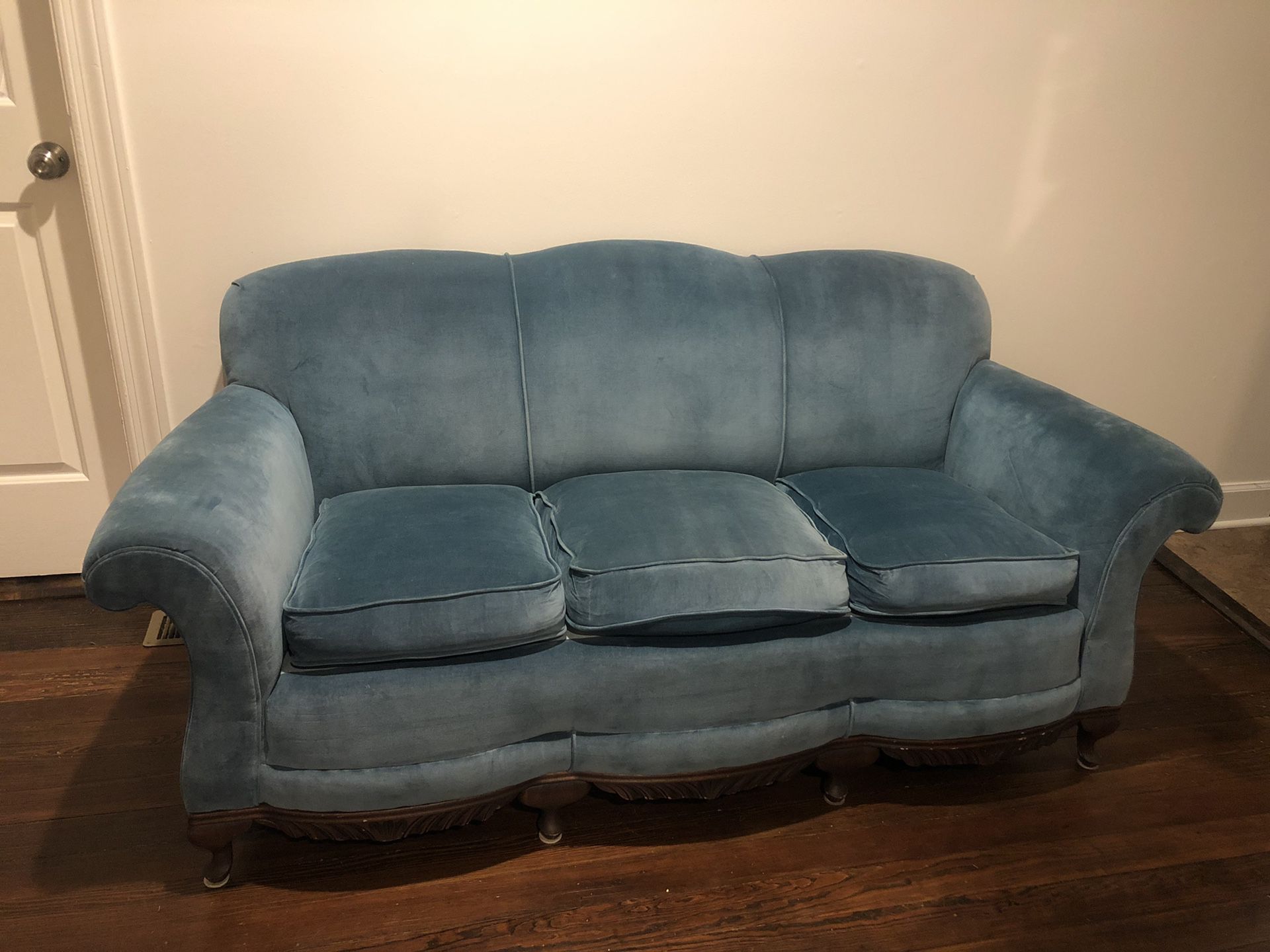 Antique blue velvet couch