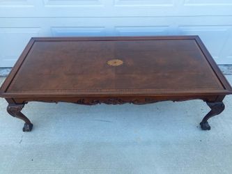 Selling beautiful vintage coffee table with side writing table missing one knob, measurements are 57”W by 27”D and 17”H Still in good condition has no