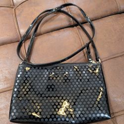 Beautiful black shiny Kate Spade crossbody
Gorgeous pink interior
Signature 