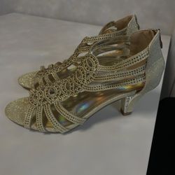 Gold high heels