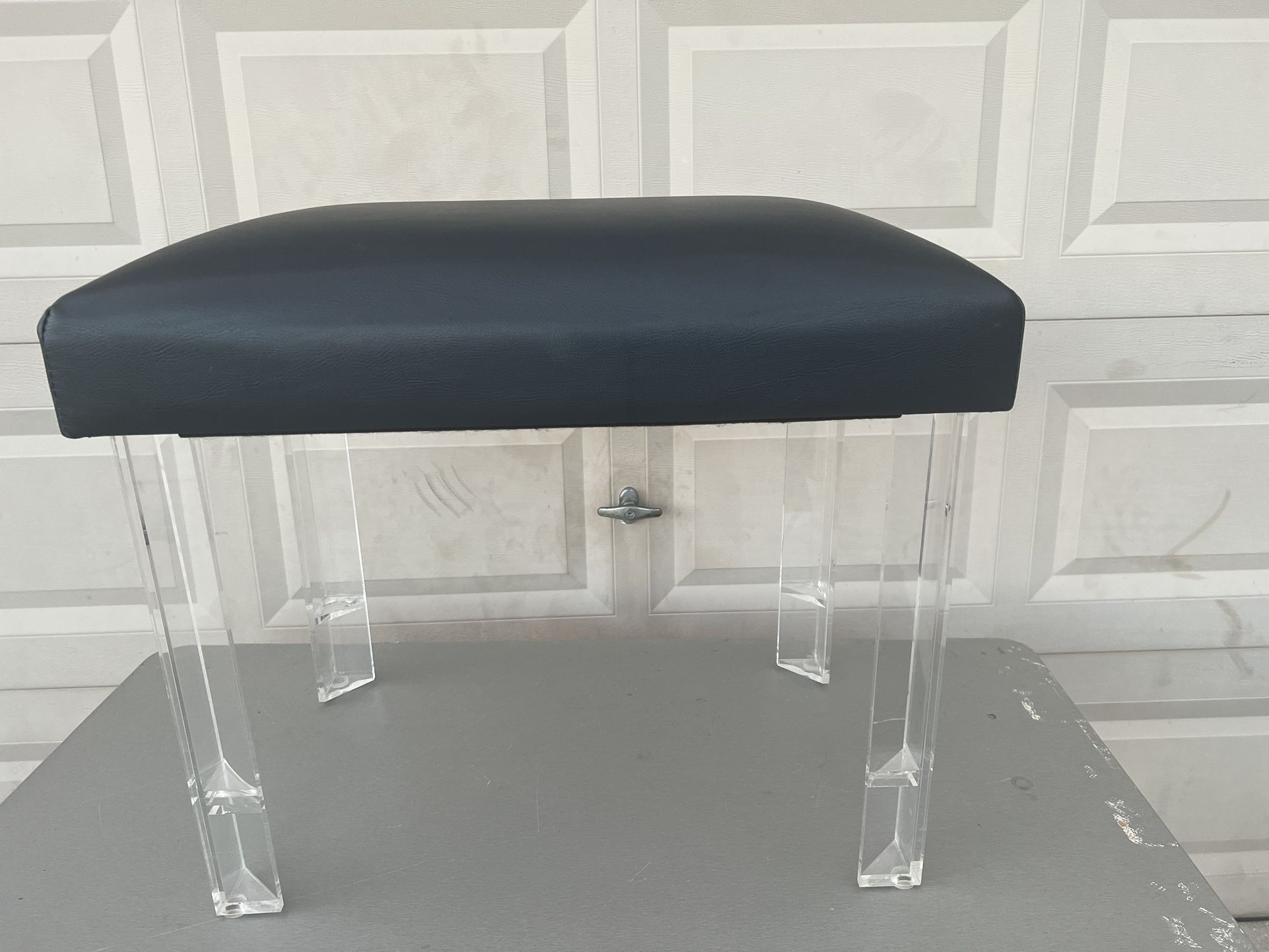 ina Navy and Acrylic Upholstered  Ottoman Foot stool corner stool. Great as a piano stool for the right person. Only some small amount of paint on one