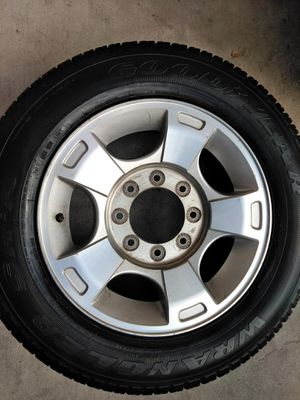Photo Set of four rims wheels n not matching 265 60 18 of Ford f250 8 lugs,, all four center caps, good condition