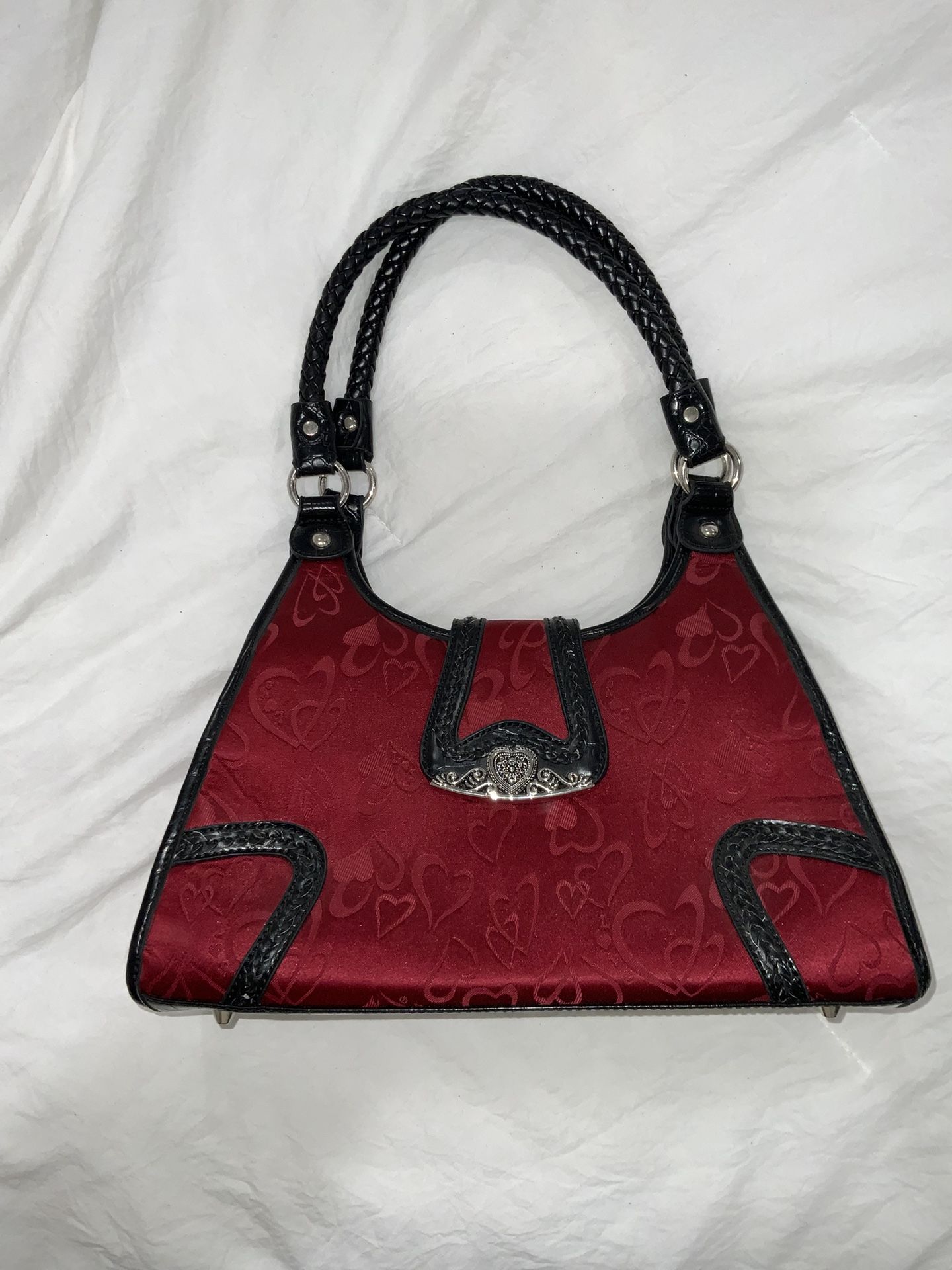 Black and red shoulder bag with silver hardware