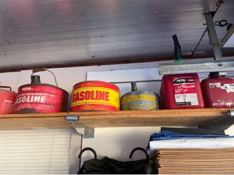 Misc lot of gas cans and others
