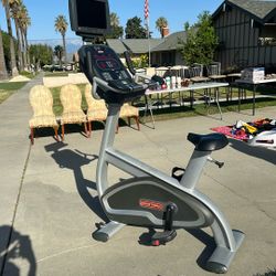 Used Star Trac Stationary Bike With tv