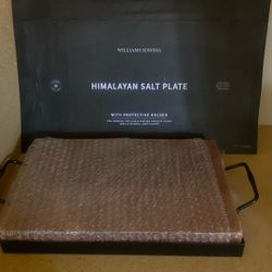 Brand new Himalayan salt plate with protective holder for cooking grilling and serving