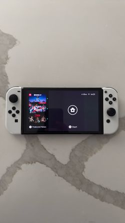Nintendo Switch OLED White Bundle + Pro Controller + 2 Pokémon Games  $375 OBO — Excellent Condition