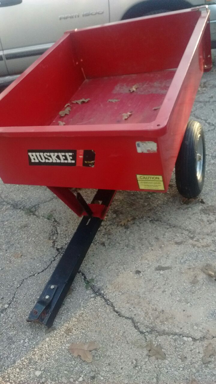 Husky 10 cubic foot still dump cart and lawn trailer