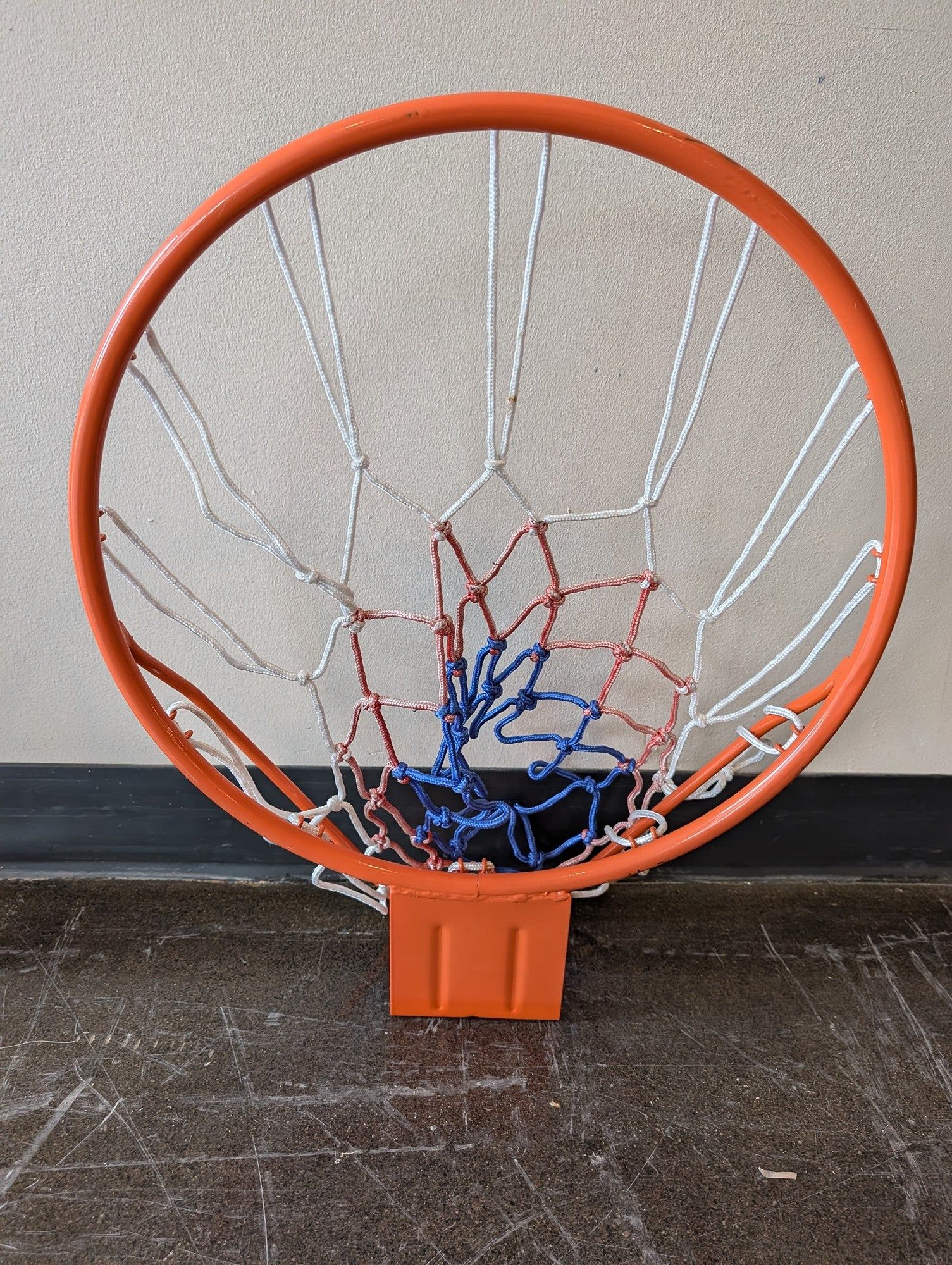 Vibrant Orange Basketball Hoop with Patriotic Net
