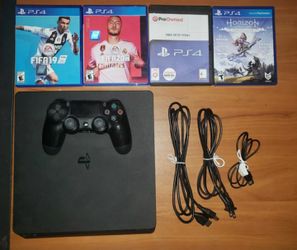 PlayStation 4 1TB with 4 Games and 1 Controller