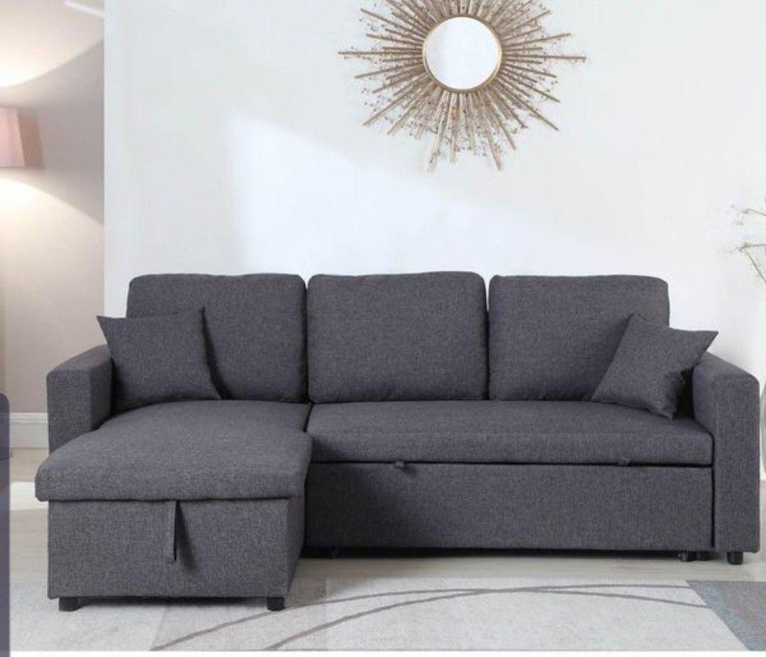 Grey sectional sofa pull out bed & storage chaise