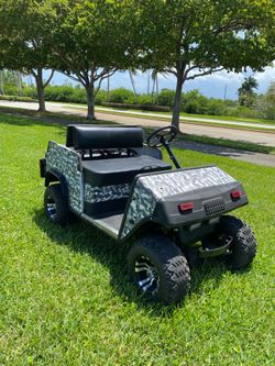 EZGO GOLF CART 36 VOLTS 4 SEATER CAMOUFLAGE PAINT