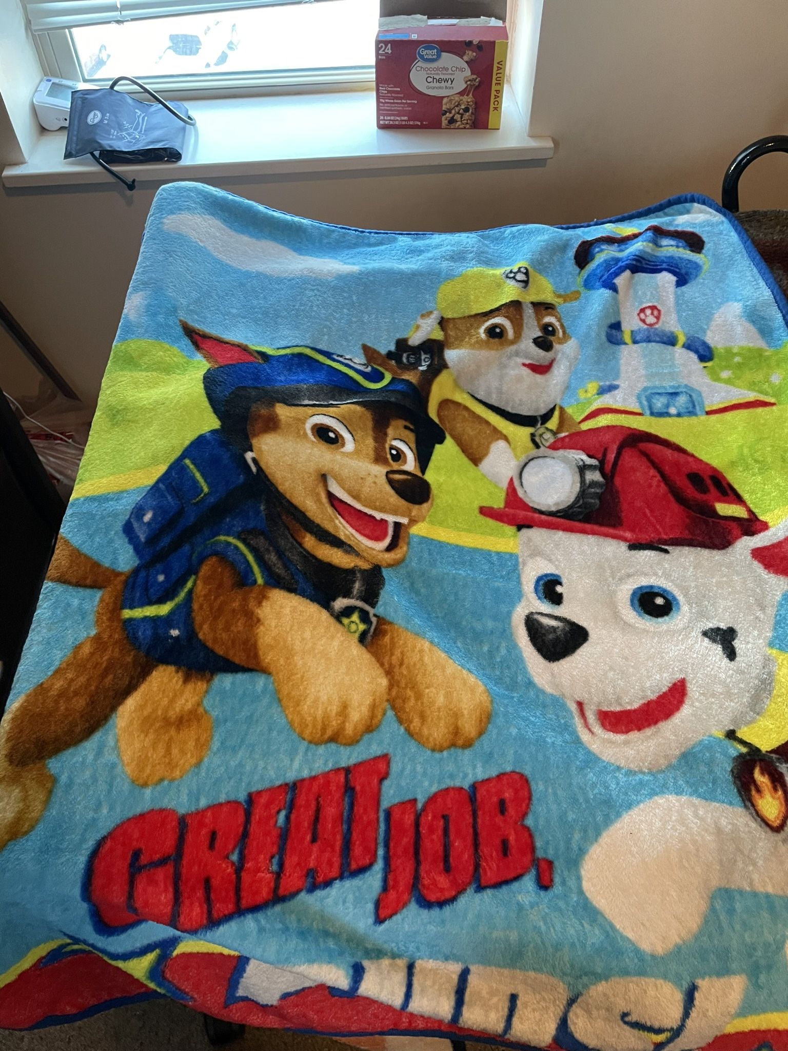 Paw Patrol cartoon design 40"W x 50"L Soft, warm and cuddly Great for travel or nap Fits twin size bed Paw